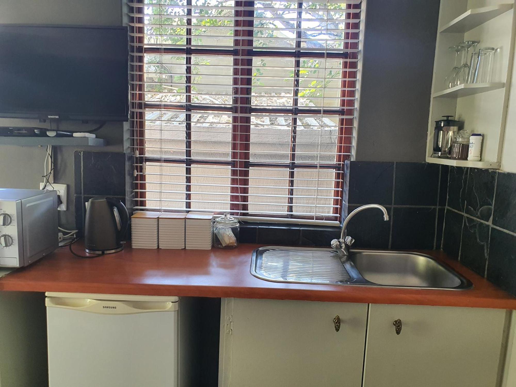 Waterhouse Guest Lodge In Muckleneuk Pretoria-Noord Δωμάτιο φωτογραφία